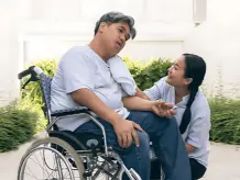 Paralysis treatment at Dr. Vamshi Krishna's clinic Dr. Vamshi Krishna consulting with patient about Paralysis